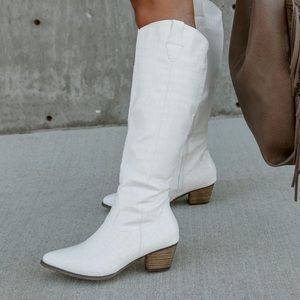Tall white cowboy boots